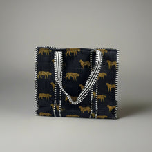  Tote bag with animal pattern on a gray background
