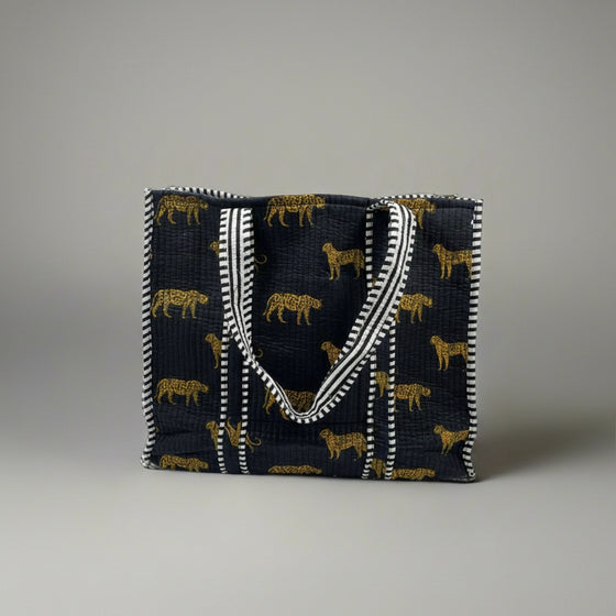Tote bag with animal pattern on a gray background